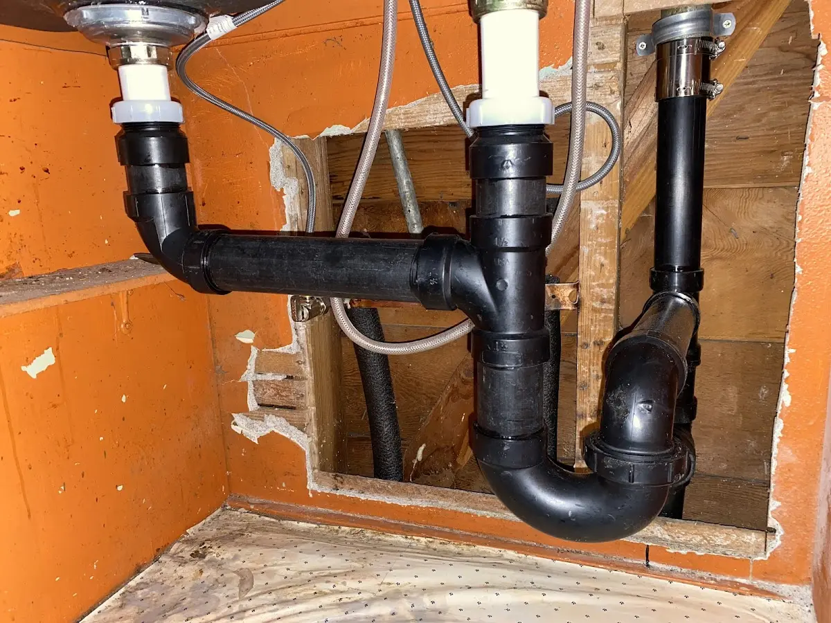 Professional Garbage Disposal Repair equipment and tools on the job in St. Cloud